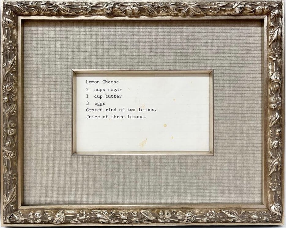A framed piece of paper with a recipe written on it.