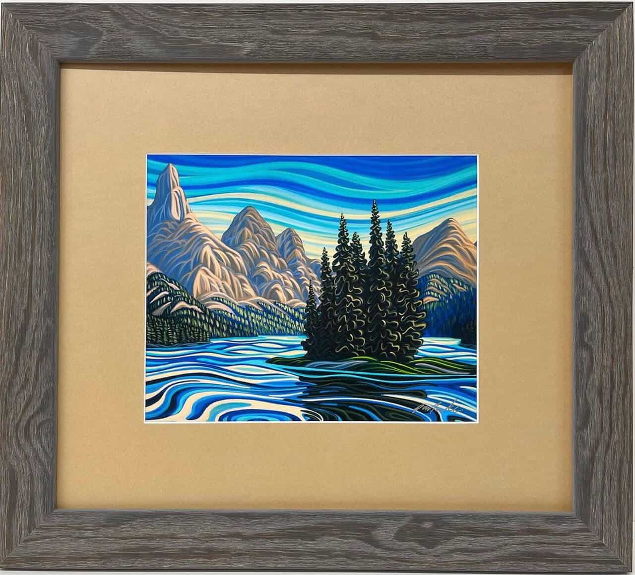 A painting of mountains and water in a frame.
