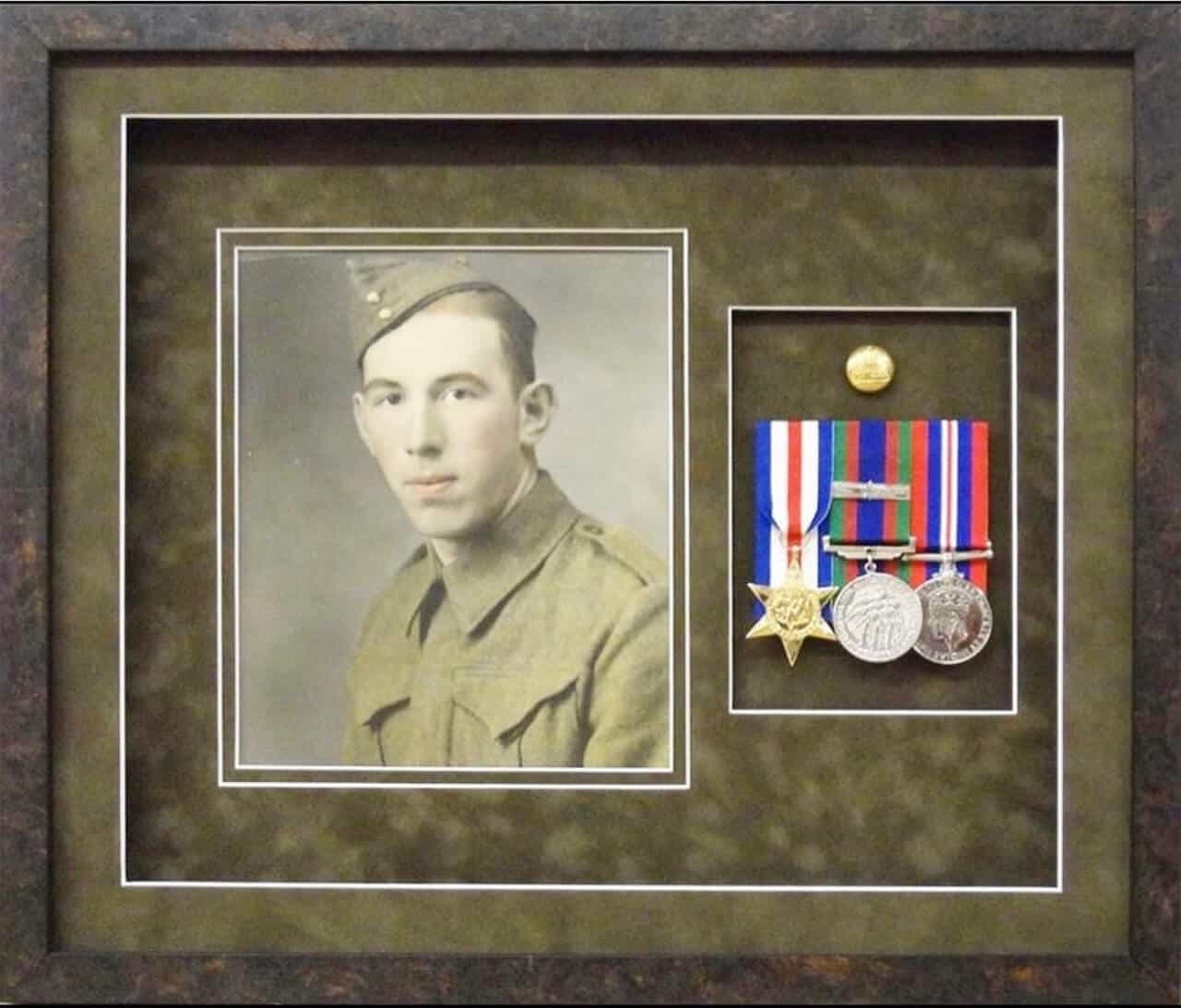 A frame with medals and a photo of a soldier.